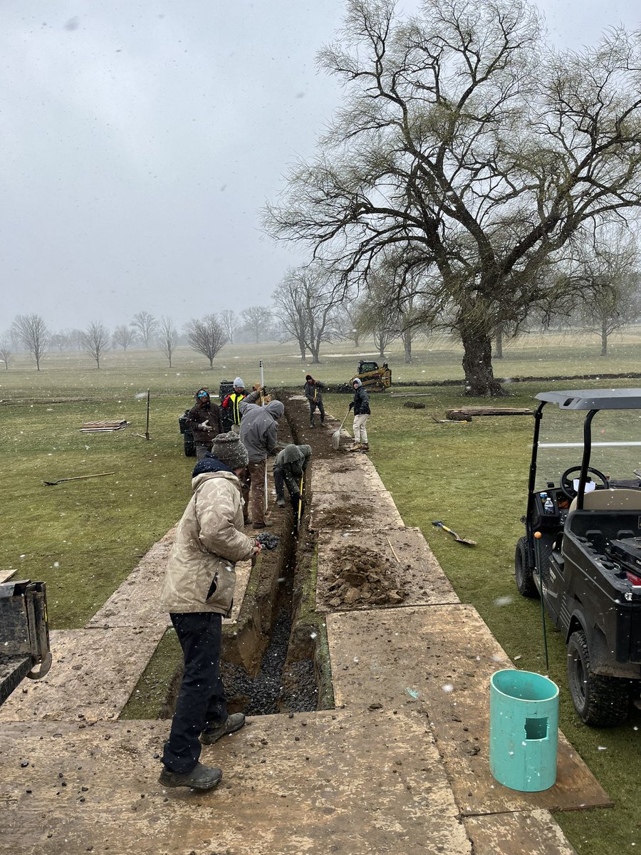 30mph wind and snow did not derail these men. Great job working in these terrible conditions.