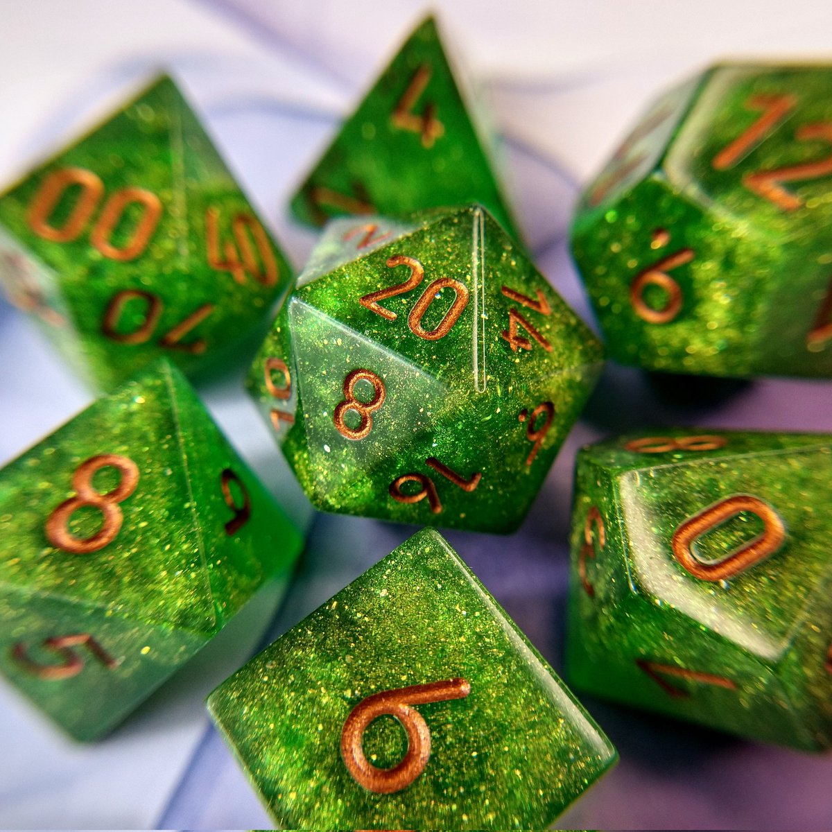EmeraldSunDice's tweet photo. Bringing back a classic, Woodland Warden! 💚 I'll have two sets of these available this Friday at 6 p.m. Central along with a bunch more dice! 😁 https://t.co/du92QHcGtl