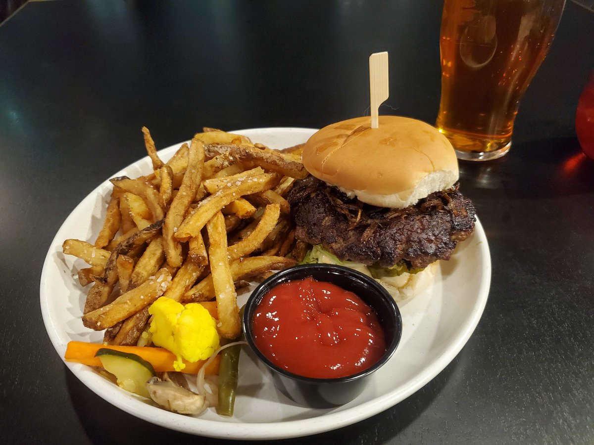 #yfcburgerbattle23 burg #10: the Juicy Lucy from STMR.36. Photo doesn't quite show it but the bun was comically small compared to the patty but that's my only complaint. The patty was juicy and flavourful on its own but the caramelized onions pickles and sauce complemented nicely