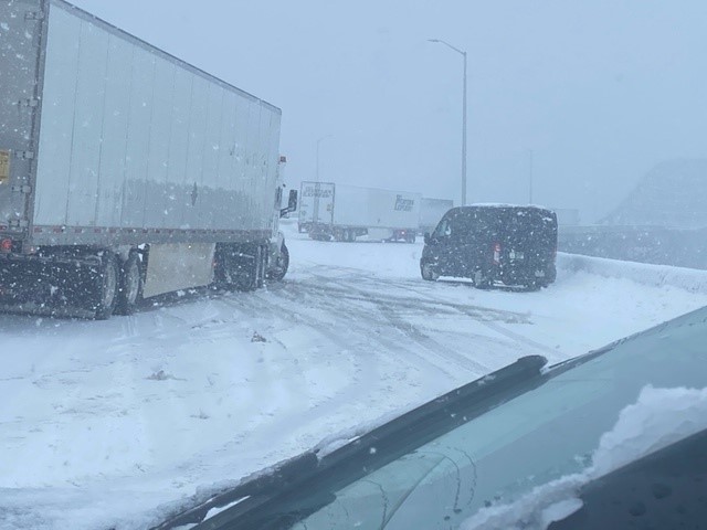 Maine State Police image of stuck 18-wheelers and other vehicles on I-95 NB trying to climb the Piscataqua River Bridge to cross from NH into Maine.
#NHTraffic #MaineTraffic