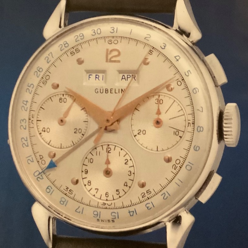 watchdossier's tweet image. A rare and attractive Gubelin triple calendar (day, date, and month) chronograph from the 1940s. A fine vintage and extremely scarce timepiece, stainless steel, with a 34.5 mm case diameter. Dial, case, and movement are signed by Gubelin est. 1854 #vintagewatches #rarewatches