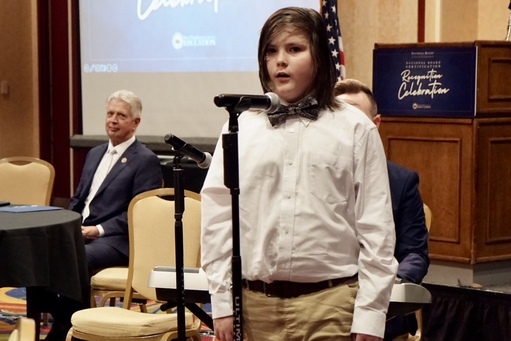 WVEducation's tweet photo. Izaiah Bess of Dupont Middle School performed the National Anthem and “Country Roads”while members of South Charleston High School's JROTC presented the colors under the direction of Maj. Ronald Bellue. 🇺🇸🎶   #WVEd #NBCT2023 https://t.co/KShhzL4E3D