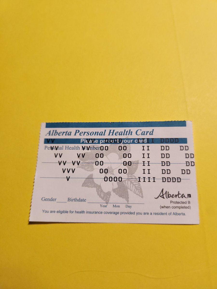 EnomisEel's tweet photo. Hmmm, my kid pointed out that the back of their newly reissued Alberta Health Care Card now says this, unlike the one they were issued 16 years ago...  can you explain @JasonCoppingAB https://t.co/TbXlU9s6yM