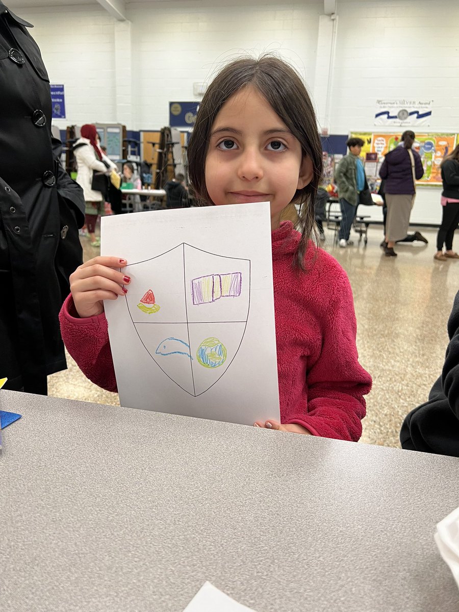 MsSlaughterBAES's tweet photo. Global Night was so much fun! Students got to create family crests! #BAESShines https://t.co/WGWdzkzCUB