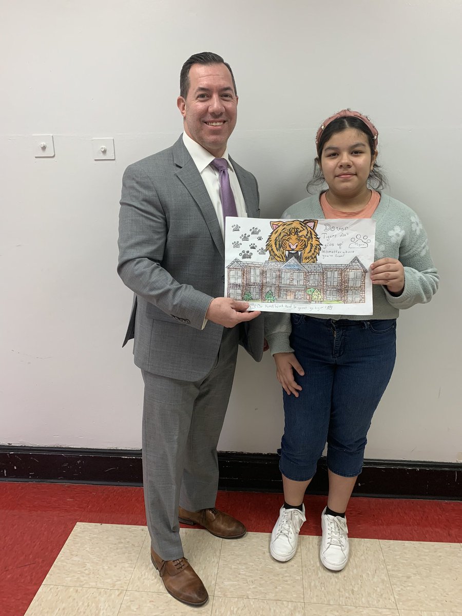 Nick_EdwardsEDU's tweet photo. Our winner for our Enrichment School Flag Competition! We will get this beautiful piece of art designed on a real flag and hang this in our gymnasium! @AcademyStreetES @PublicDover #winner #flag #gotigers #bekindworkhardbegreat #acadeMYschool https://t.co/qiCgelgFXO