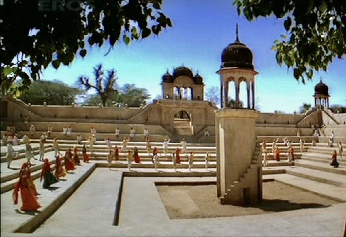 AmyStone2022's tweet photo. This SRK movie is a fantasy love adapted from Indian folklore, and it advocates women’s rights.

It was a moderate success at the BO.

Beautifully filmed,with a rich color palette,stunning landscapes and elaborate costumes, it featured SRK in dual roles.

Can you guess the movie? https://t.co/0N5O6XvKDU