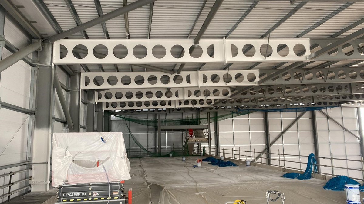 A large scale intumescent paint project on a complex warehouse unit completed for @Farrans_UKI. High loadings were required and up to 5 applications needed on certain steels. Rafters were hand painted to comply with the scheduling and aesthetic requirements. #fireprotection