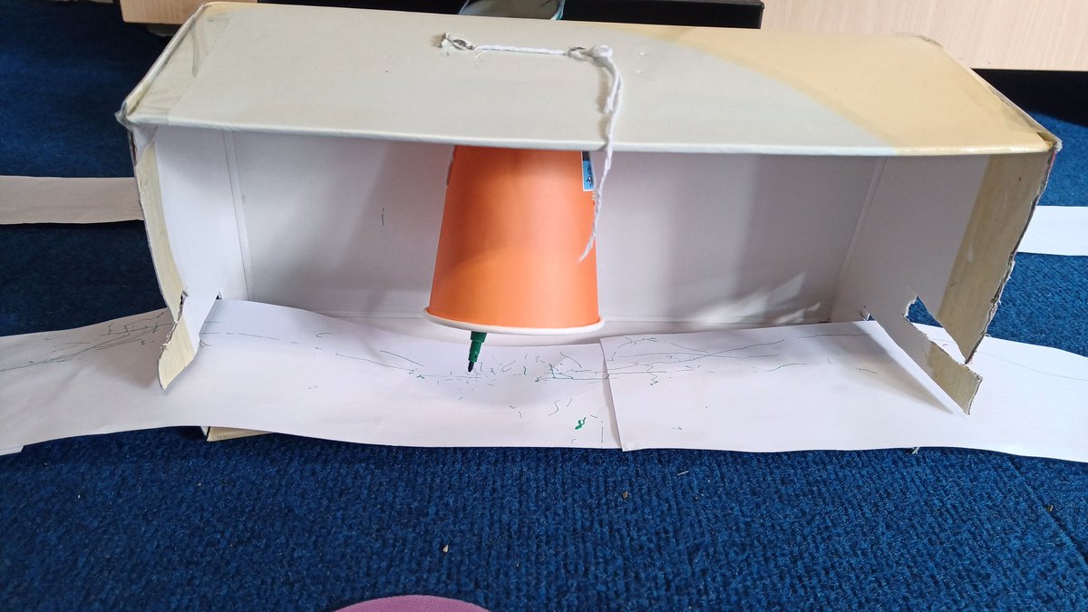 MissAliSPS's tweet photo. We have been learning about volcanoes, earthquakes and tsunamis as part of our Geography project so for Science Week we decided to make seismographs. The children worked together to produce working models and were fascinated at recording movement in the classroom. @SummerswoodPS https://t.co/rbQ1KVrtCs