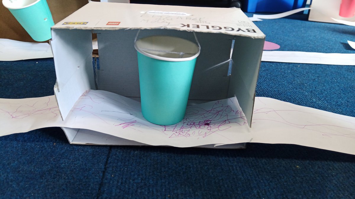 MissAliSPS's tweet photo. We have been learning about volcanoes, earthquakes and tsunamis as part of our Geography project so for Science Week we decided to make seismographs. The children worked together to produce working models and were fascinated at recording movement in the classroom. @SummerswoodPS https://t.co/rbQ1KVrtCs