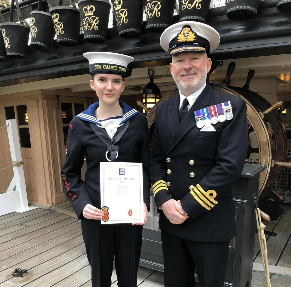 RFCAforWales's tweet photo. Congratulations to Leading Cadet Maisie of  @fishguardscc  (West Wales District) on her investiture as the First Sea Lords Cadet for South West Area 2023.
The Area Officer, Cdr Gary Mills RN  joined the prestigious event on board HMS Victory last month. https://t.co/RIuUXwkqfw