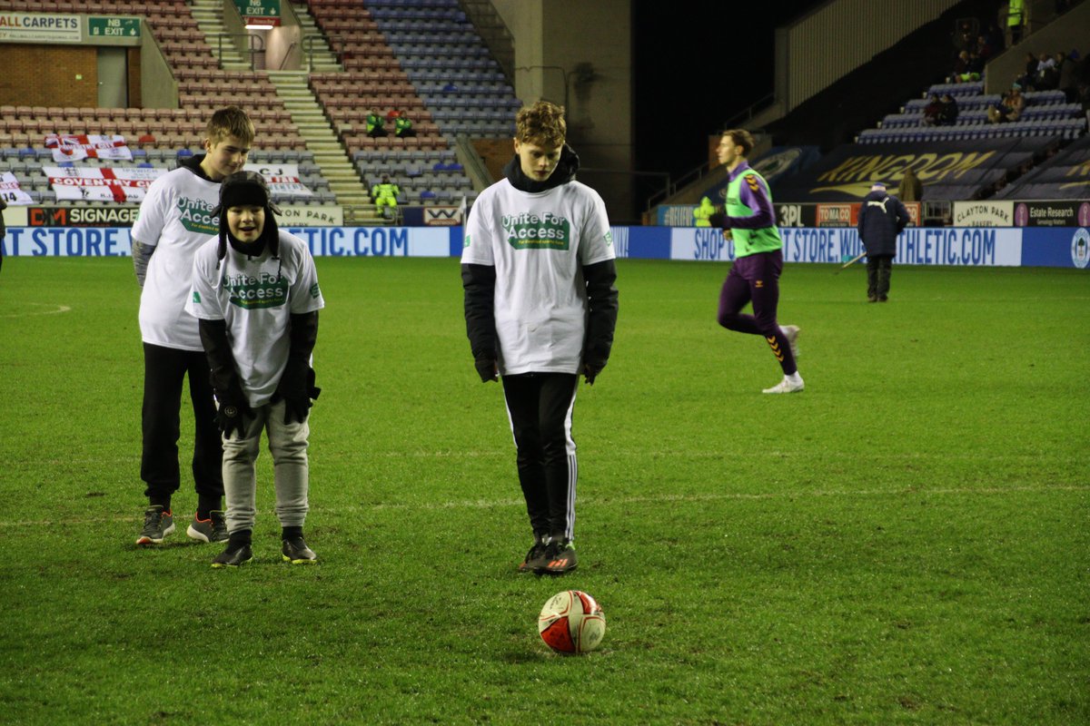 LaticsCommunity's tweet photo. ⚽️ Last night, in support of @LaticsOfficial's #UniteForAccess fixture,  we were delighted to welcome participants from our #PLKicks Disability Football session to take part in a half-time penalty shootout!

#wafc 🔵⚪️ | @lpftweets https://t.co/pI1YNpvkte