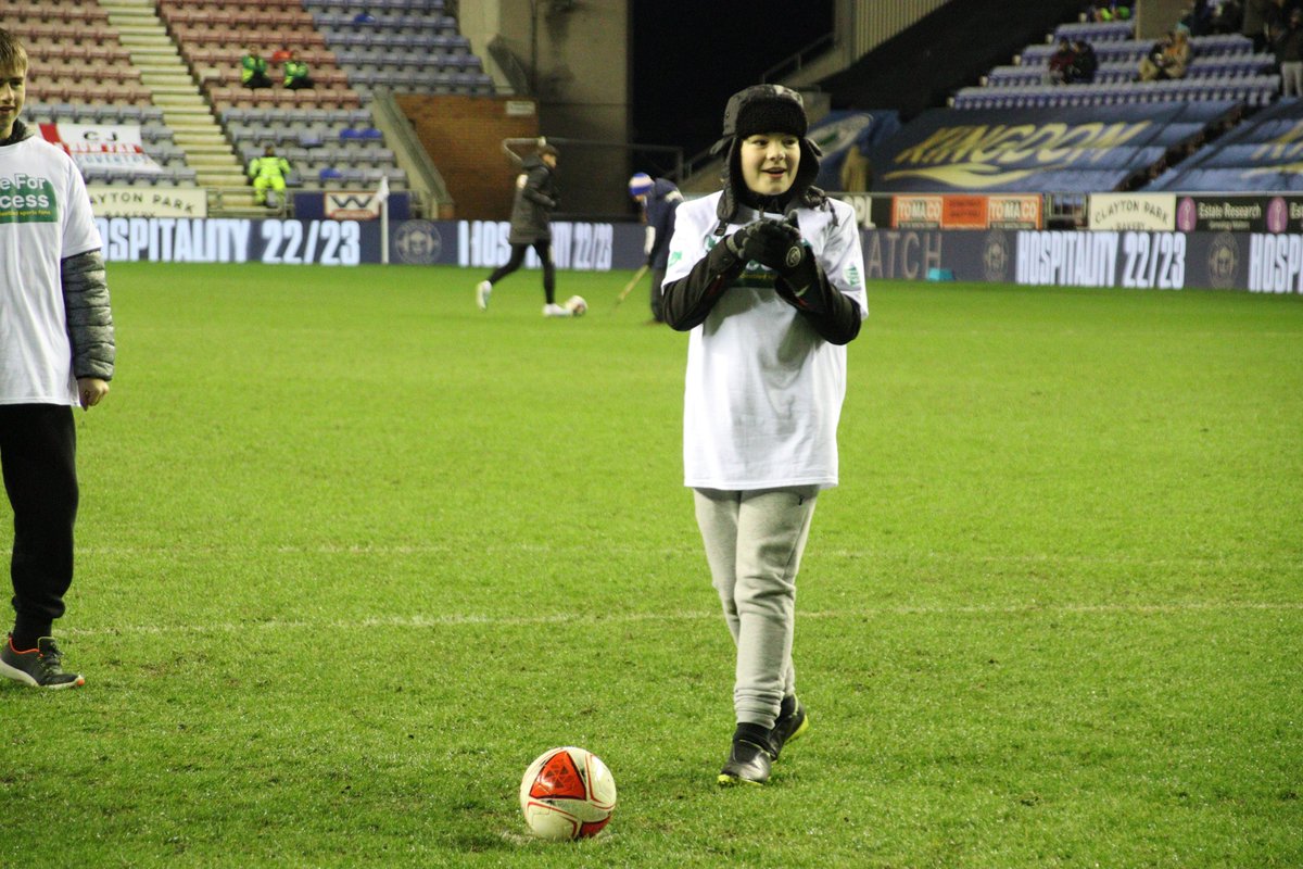 LaticsCommunity's tweet photo. ⚽️ Last night, in support of @LaticsOfficial's #UniteForAccess fixture,  we were delighted to welcome participants from our #PLKicks Disability Football session to take part in a half-time penalty shootout!

#wafc 🔵⚪️ | @lpftweets https://t.co/pI1YNpvkte