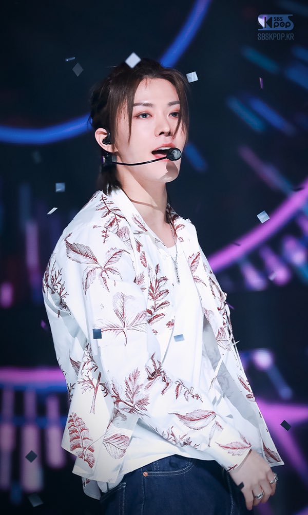 white casual t-shirt, floral-printed overcoat, and man bun. the entire ambiance of glee-glowing shades with an ecstatic grin I paraded at once depicts me as if I'm the summer delight, burning and freshening up.