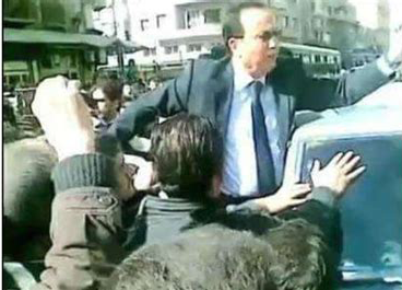 STJ_SYRIA_ENG's tweet photo. Saeed Sammour, the Minister of Interior at that time, came to the place of protest and rebuked the protesters instead of listening to their demands, and said his famous saying,
"Shame, people, this is called a #demonstartion!."
#Syrian _ Uprising #Syria #Hariqa_protest https://t.co/KcfFVD2i11