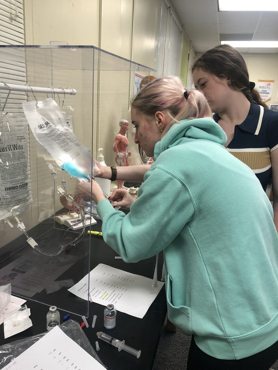 ACCPharmacyTech's tweet photo. Learning about &amp; preparation of IV nutrition (TPN) for patients who can’t eat solid food. Food coloring added for fun. @APSCareerCenter @arlingtontechcc @APS_CTE https://t.co/PIRAXAysFL