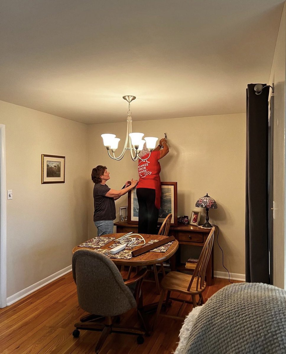 OSM team hard at work hanging pictures 🤩