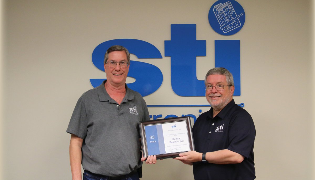 STIElectronics's tweet photo. Randy Baumgarden celebrates 35 Years with STI
with a cake he shared with his colleagues. In recognition of this milestone, David Raby, President/CEO, presented Baumgarden with a certificate &amp; monetary bonus in appreciation of his dedicated service.
Congratulations Randy! https://t.co/Pvpqe3qVJi