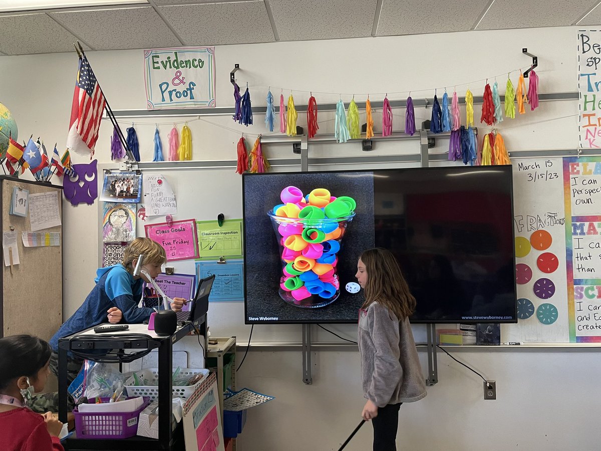 ThompsonFWES's tweet photo. We ❤️ @SteveWyborney’s Esti-mysteries! A great student-led activity that activates our brains before the math lesson. We use 100s charts to record our thinking. #FWESDestinationLearning https://t.co/1c1N2Rbrnu
