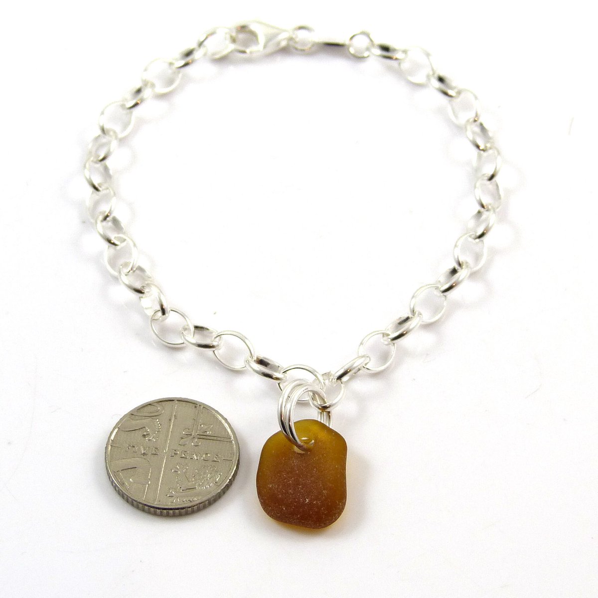 TheStrandline's tweet photo. Sea Glass Bracelet, Sterling Silver Bracelet, Amber Sea Glass, Sterling Silver Bracelet 4mm links https://t.co/6ZCNKEVA9y #Etsy #thestrandline #EarlyBiz #northumberland #warkworth #UKGiftAM #shopindie #UKGiftHour #supportsmallbusiness #MultipleBracelets https://t.co/3JU95p92ce