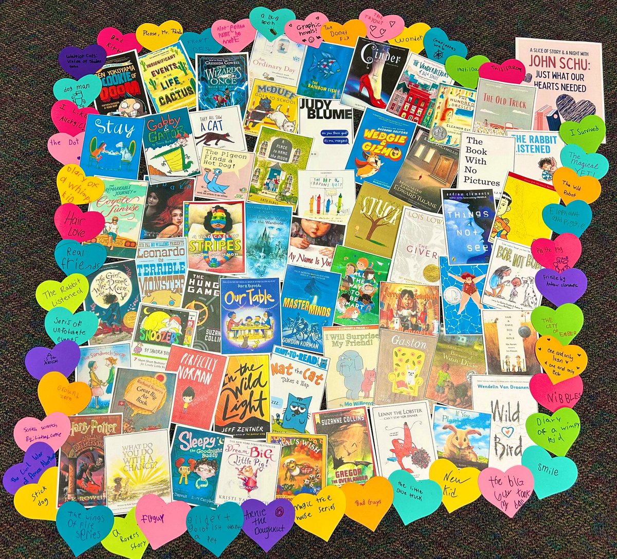 Last week at A Slice of Story with <a href="/MrSchuReads/">John Schu</a>, we started the event by placing images of our 45 favorite books hidden on chairs around the auditorium in honor of <a href="/studiocastillo/">Lauren Castillo 🦔🏳️‍🌈📚</a>  including 45 books they love in This is a Story! Then those 45 kids received This is a School. 🥰