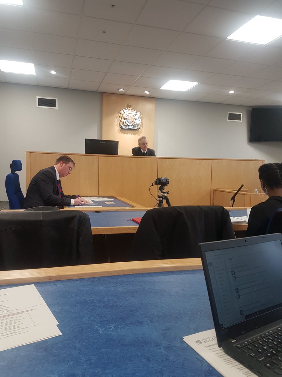 'Judge' Alan Bridger, veteran solicitor, and <a href="/UniofBradford/">University of Bradford</a> alumnus explaining 'leading questions to the budding advocates! <a href="/BradUniLaw/">School of Law (University of Bradford)</a> mock trials