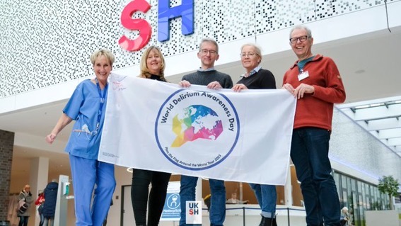 At #WDAD2023 we are starting the project 'Pass the Delirium Awareness Flag around the World' at @UKSH_KI_HL Over 100 clinicians in 27 countries will receive the flag, perform delirium projects, sign the flag, and ship it to the next. Follow the flag on deliriumday.com