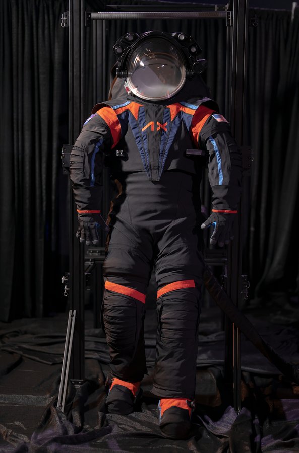 The Artemis III spacesuit prototype, the AxEMU. Though this prototype uses a dark gray cover material, the final version will likely be all-white when worn by NASA astronauts on the Moon’s surface, to help keep the astronauts safe and cool while working in the harsh environment of space. Credit: Axiom Space