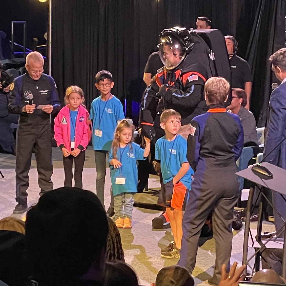 BettinaInclan's tweet photo. Little Charlotte was one of my favorite parts from today’s @Axiom_Space and @NASA next generation spacesuit reveal. She wouldn't stop holding the hand of the #AxEMU suit.  ❤️❤️ https://t.co/gmJUw4TXLQ