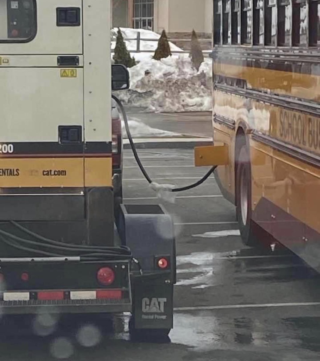 I kid you not…. diesel generator charging one of Kamala’s Electric School buses she loves so much.