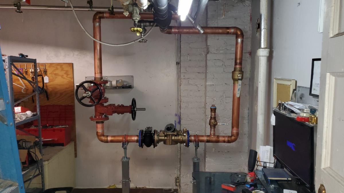 ParPlumbing's tweet photo. The Par Group removed a DEP primary water meter from an underground pit and created a proper NYC DEP meter set in the basement. The new installation is properly supported and meets all DEP height and clearance requirements. https://t.co/gfsdwiLStr