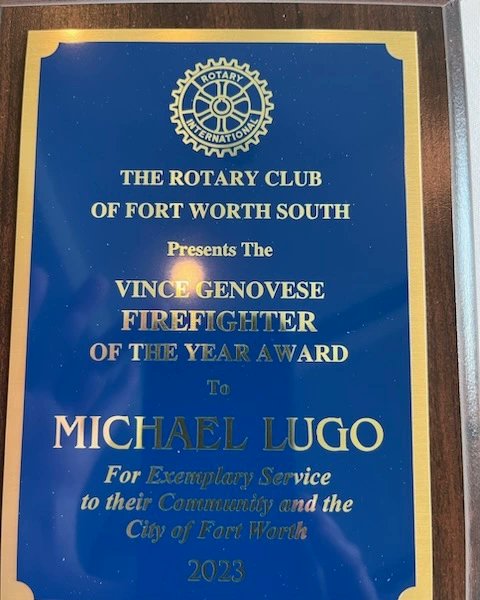 FWfirefighters's tweet photo. Yesterday, Lieutenant Mike Lugo was presented with the Vince Genovese Firefighter of the Year award by the Rotary Club of Fort Worth. Lt Lugo is assigned to the Arson and Bomb Division. Accepting the award on his behalf is Battalion Chief David Jones. Congrats Mike! https://t.co/QAudyv7NFv