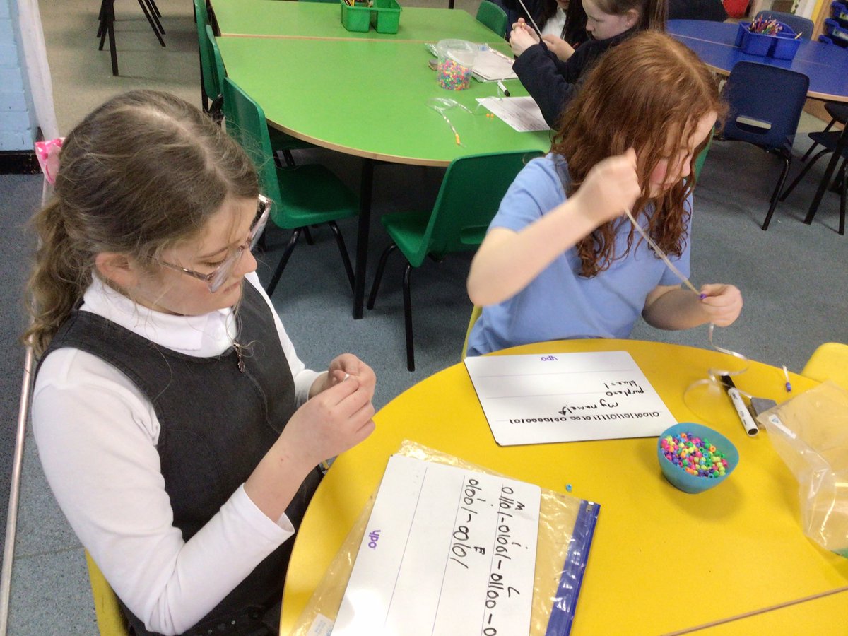 HelmshoreSchool's tweet photo. In STEM club this week we learnt about Katie, an apprentice software engineer from MI5. We used binary code to create charms with our names and messages for friends and family. 🧑🏼‍💻 @Stemettes #stemillions https://t.co/IPYtyDM2V1
