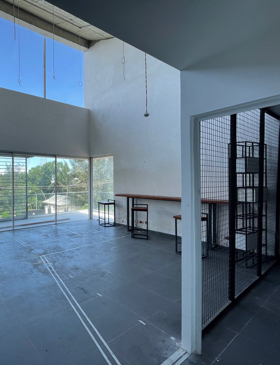 arcpenter's tweet image. Learnt the design rules, then I break them consistently break them. Everyone is hiding under ‘luxury’ lately to create spaces with nature hues and bland colors . 

A tech office space I designed with a loft above and work pods below . Colors are inspired by company brand.