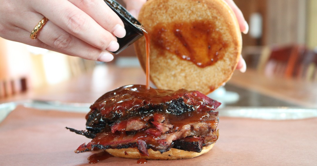 Ten50BBQ's tweet photo. Satisfy your cravings with a slow-cooked brisket sandwich from Ten50! The juicy, tender meat is perfectly paired with our tasty BBQ sauce and soft buns!
#Ten50 #BBQ #TexasBBQ #DFWFoodie #RichardsonTX #BrisketSandwich #GrillMaster #BBQSandwich #Savory https://t.co/MKUwMmPNFS