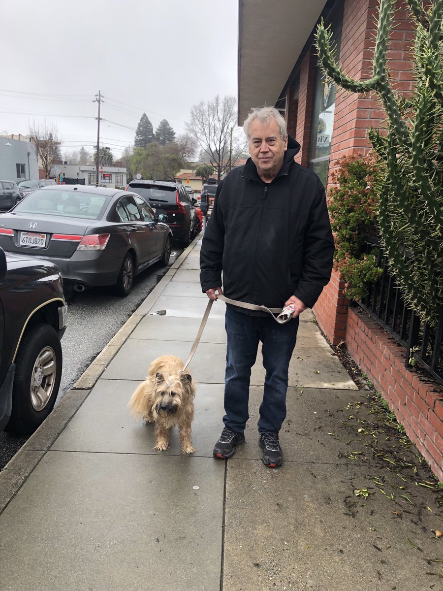 fitzpoet's tweet photo. Here we are on Union Street in Santa Cruz. Sam has been given 6 to 9 months to live. He has cancer. On our walk people always say he’s cute. I asked one of them to take our picture. I am going to do this until we can’t. His name is Samuel Beckett, Irish but he writes in French. https://t.co/qGm8PqSz6L