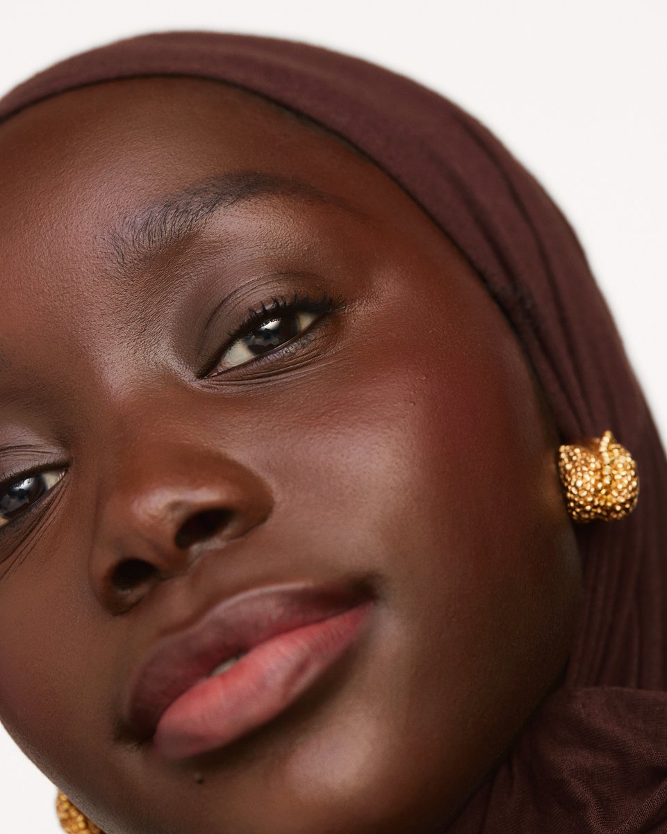 Our dear Oumy wears Desert Date Cream Multistick in shade “Spice” - a rich plum. We love it here ✨✨