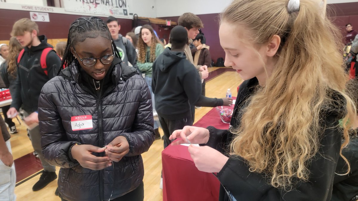 NetSteady's tweet image. Today we were at Canal Winchester HS @CWHS_Office for their career fair and talking about our summer internship program. Here is one of our team members, Emily, showing a student how to make data cables.