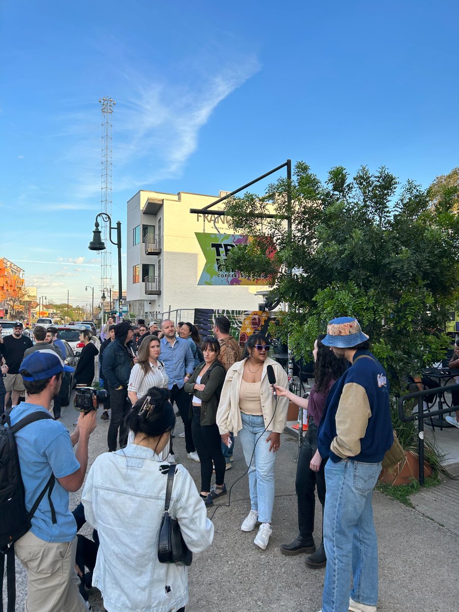 ...and we were overwhelmed with the interest and had to double capacity! Check out that line outside the venue -- and spot our team doing some street interviews (coming soon 👀)