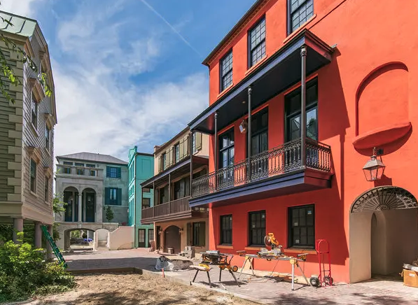 StrongTowns's tweet photo. Catfiddle Street in Charleston is a newly built development of 24 homes in a single acre. This should be broadly legalized across North America. https://t.co/RBfPSFsKW6