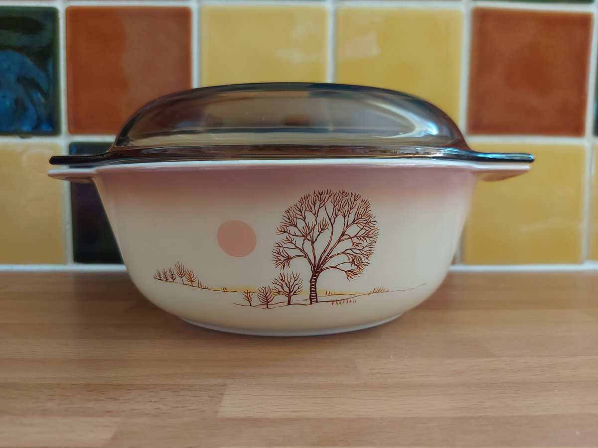 HummingLeftBird's tweet photo. Here's a rare trio of Pyrex England Autumn Moods pattern Casserole Dishes. If you look closely at the pattern on each one, the sun is in a different position. Either sunset or sunrise. #vintageshowandsell https://t.co/nMMeMhUZMm