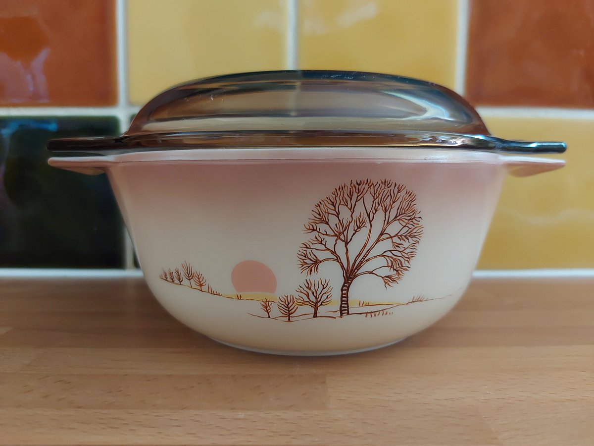 HummingLeftBird's tweet photo. Here's a rare trio of Pyrex England Autumn Moods pattern Casserole Dishes. If you look closely at the pattern on each one, the sun is in a different position. Either sunset or sunrise. #vintageshowandsell https://t.co/nMMeMhUZMm