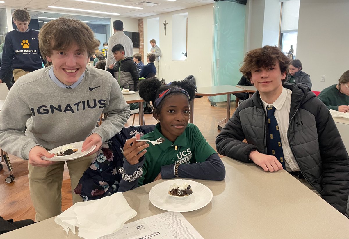 CATAMDG's tweet photo. Did you know yesterday (3/14) was annual pi day? 

The Arrupe homework club celebrated with students at @ucscleveland by making mini pies and reciting the numbers of π.
 
What a delicious and fun post-homework treat! https://t.co/0dVKwdrnjb