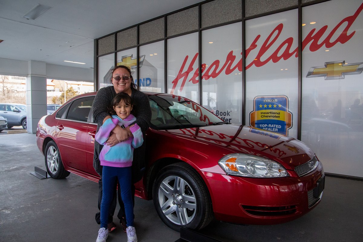 NKCSchools's tweet photo. Surprise! Johna Fox, a dedicated district parent, drove home today in a new car! Thanks to partners @HeartlandChevy_, @DiscountTire, &amp; @oreillyauto,  along with the hard work of our @CtecAutoTech, this @NKCFood employee has a safe vehicle for her family. https://t.co/8flo2AcFLD