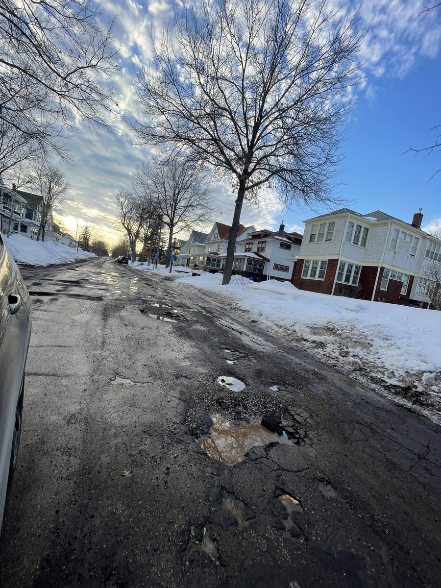 STPothole's tweet photo. Beautiful day in @SaintPaul! Trying to see the potholes half full…not half empty… https://t.co/vSko97M3DM