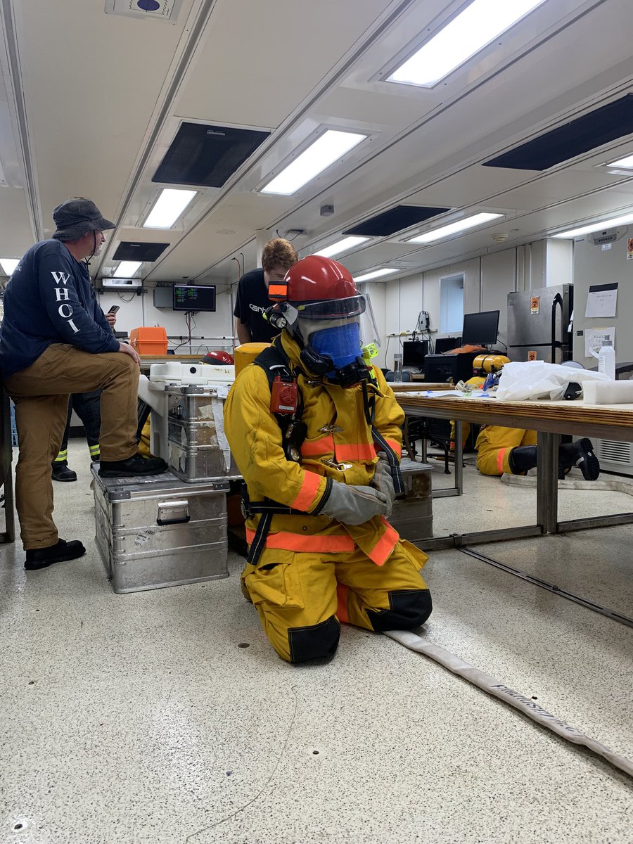 microbiaki's tweet photo. R/V Atlantis Day 41: Last steaming day. Firefighting training using our gear boxes to create an obstacle course. Members of the crew, blindfolded and fully equipped are following the hose. Smooth, bump, bump to go to the pump. Pretty intense experience to watch. https://t.co/j7kNYiaR5g