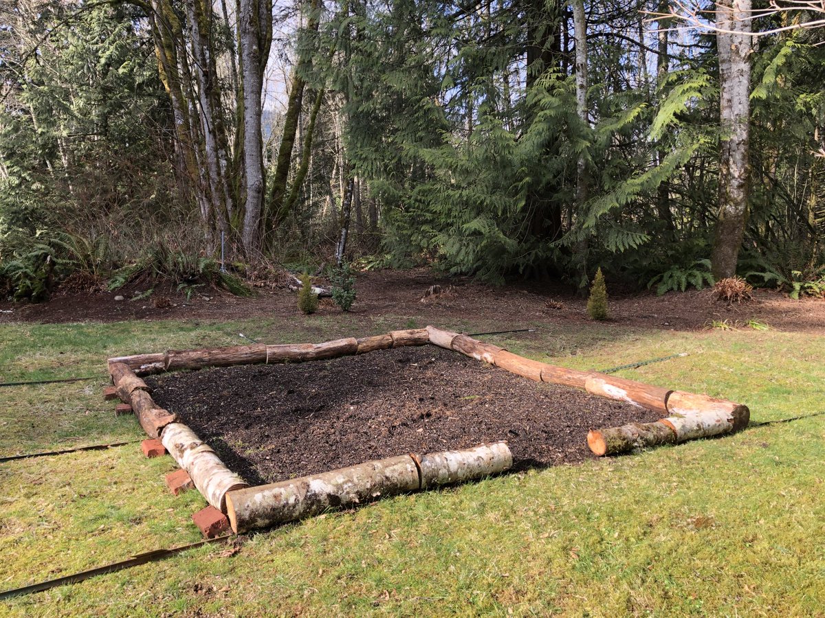 How do you make a raised bed vegetable garden in 5 acres of woods? Use logs from trees that fell during the winter and locate the garden in a sunny part of the yard. Add a deer fence and hope for warmer weather than tonight’s 30 degrees! #beHappy #Gardener