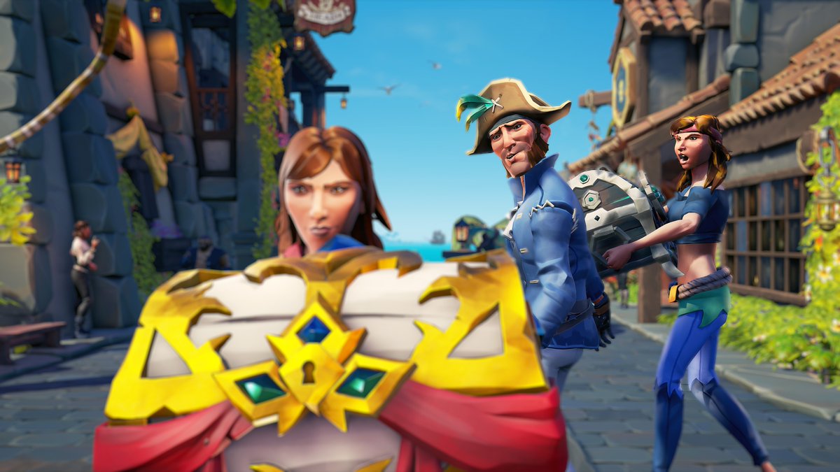 A take on the Jealous Girlfriend Meme. Three pirates in the street of a stone-built Outpost in Sea of Thieves. Two pirates pass a female pirate on the left who carries a large treasure chest made with white wood and gold embellishments. The male pirate that has passed her, turns his head to admire what she carries, while the third pirate who accompanies the male, looks outraged. She carries her own black and silver treasure chest.