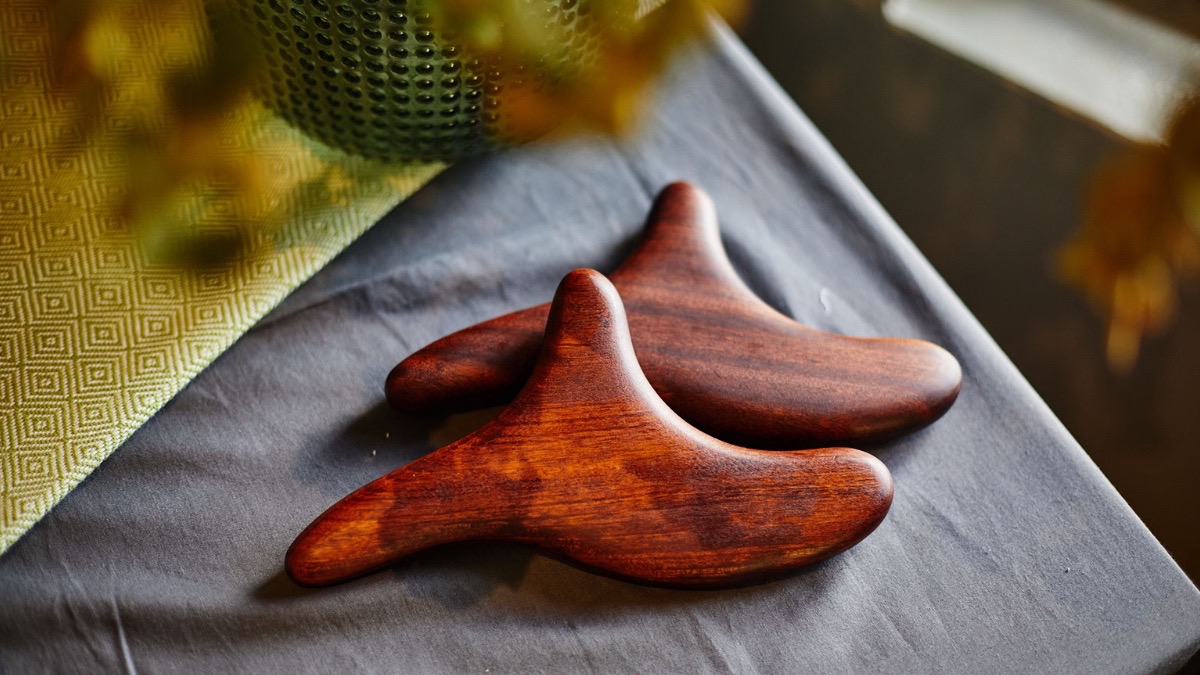 Our full-body deep tissue massage makes use of tools like this Acacia wood tri-touch tool to relive tension in the deeper layers of muscle with firmer pressure and slower strokes.

Photography: Craig Scott Photography