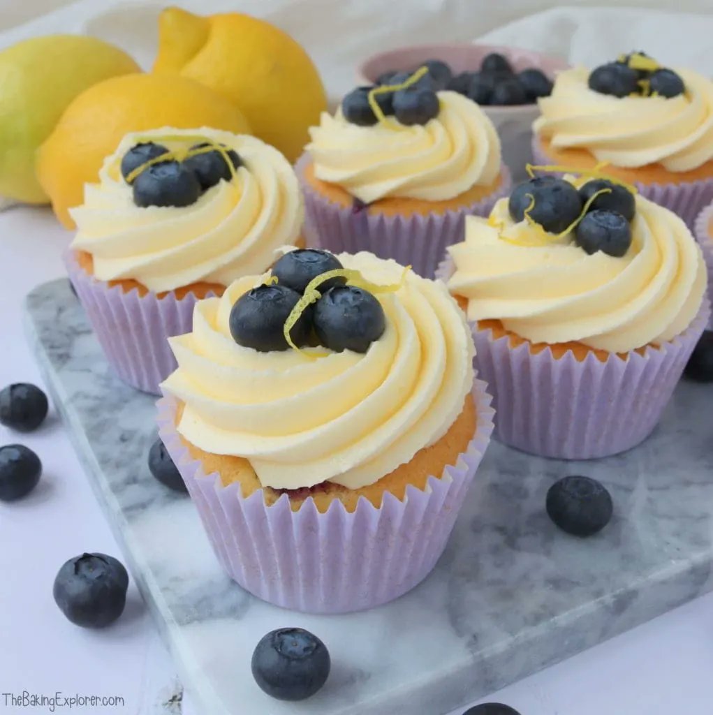These Lemon &amp; Blueberry Cupcakes are super pretty and very tasty. They would be perfect for Mother's Day this weekend! Get the recipe here: buff.ly/33VyLiS