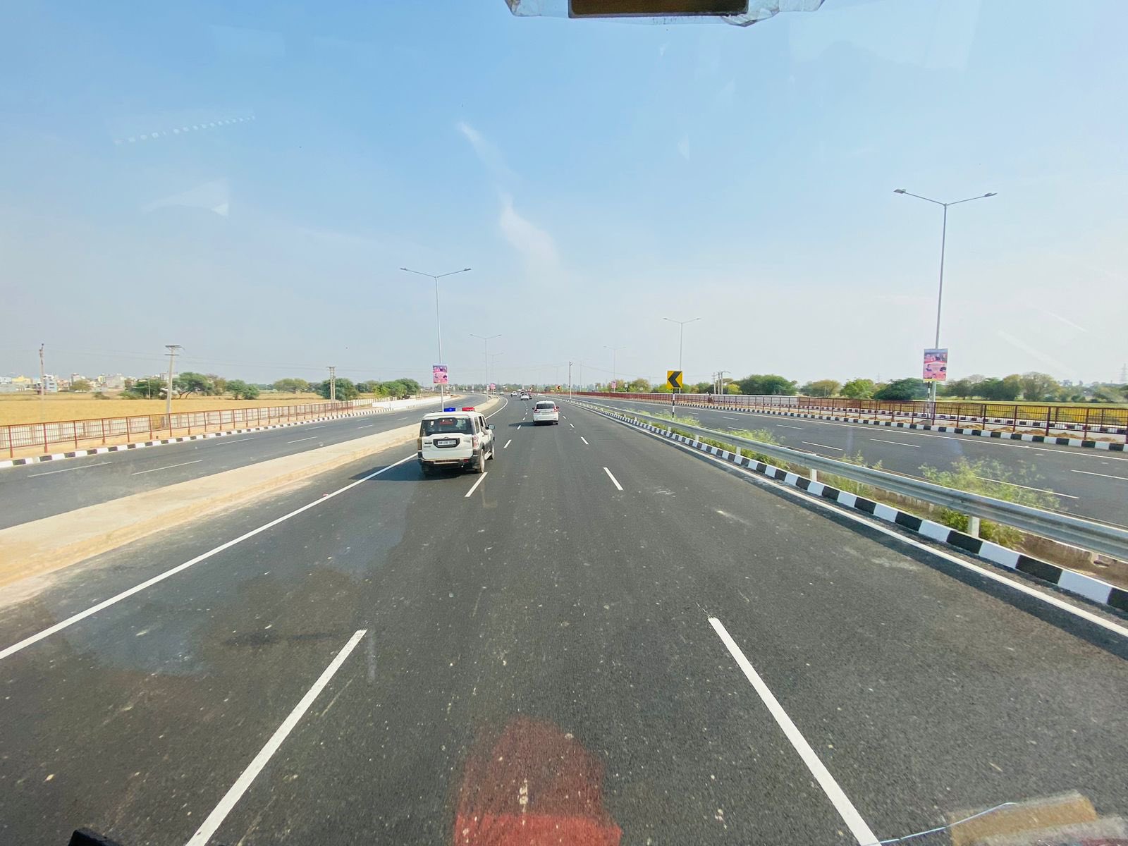 Long exposure image of Delhi Metro passing over the main ring road in New  Delhi, India Stock Photo - Alamy